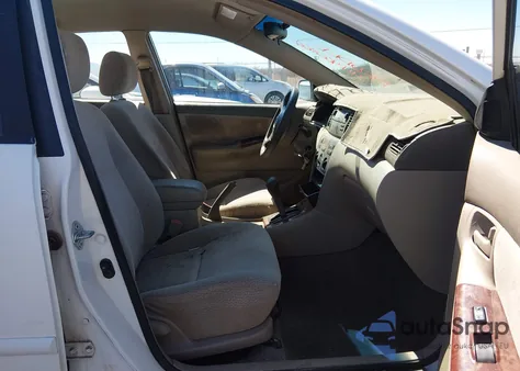 2003 Toyota Corolla Le z USA, uszkodzony, nr VIN JTDBR32E730017228